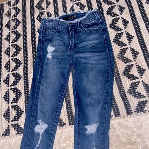 High waisted ripped dark jeans